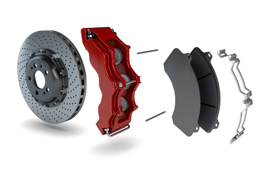 Disassembled Brake Disc with Red Calliper from a Racing Car